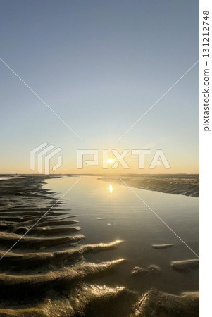 Sunset over Plage Peirere in Arcachon creates stunning beach landscape Sunset over Plage Peirere in Arcachon creates stunning beach landscape 131212748