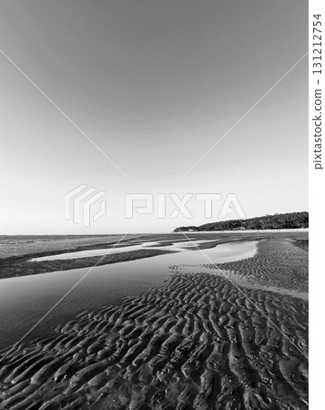 Serene beach at Plage Peirere in Arcachon with beautiful forest backdrop 131212754