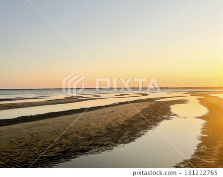 Sunset over Plage Peirere in Arcachon creates stunning beach landscape 131212765