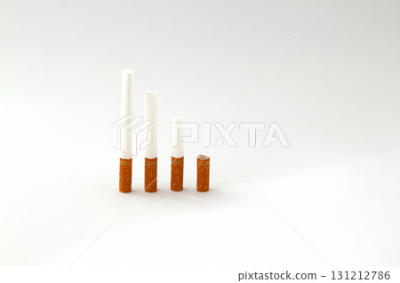Nicotine addiction, a lot of cigarettes on a white isolated background 131212786