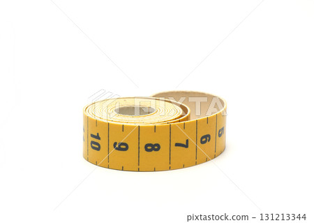 Yellow isolated metric measuring tape isolated on white background. Centimeter, close-up Yellow isolated metric measuring tape isolated on white background. Centimeter, close-up 131213344