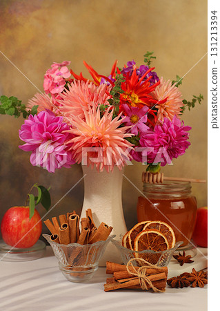 Autumn banner with a beautiful bouquet of dahlias in a vase, honey, apples, pomegranates, cinnamon and star anise on an elegant background, autumn greeting and thanksgiving concept, Autumn banner with a beautiful bouquet of dahlias in a vase, honey, apples, pomegranates, cinnamon and star anise on an elegant background, autumn greeting and thanksgiving concept, 131213394