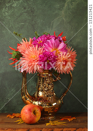 Autumn floral arrangement with dahlias in a vase, abstract still life with apples and flowers, Thanksgiving holiday banner, autumn greeting. Composition for a cozy mood 131213421