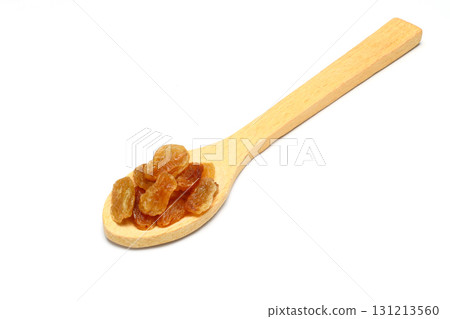 Brown raisins in wooden spoon isolated on white background with clipping path. Top view. Flat lay 131213560