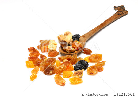 Mix of nuts and dried fruits in wooden spoon isolated on a white background. Mix of nuts and dried fruits in wooden spoon isolated on a white background. 131213561