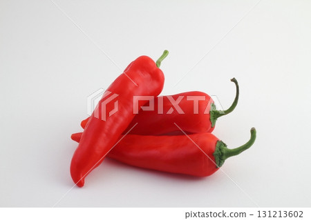 Red bell pepper closeup photo on white background. Fresh vegetable isolated. Fresh ripe bell pepper. Red bell pepper closeup photo on white background. Fresh vegetable isolated. Fresh ripe bell pepper. 131213602