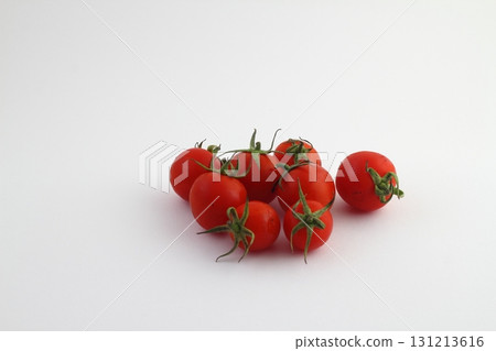 Red tomato isolated on white background. Top view. Red tomato isolated on white background. Top view. 131213616