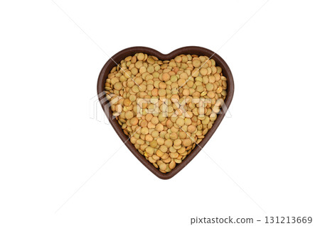 Green lentils in wooden bowl on isolated white background. Top view, copy space. Flat lay. 131213669