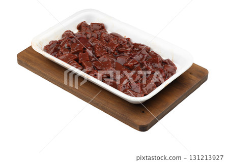 Cut raw beef liver with onions, spices, chili peppers and dill on wooden table, flat lay Cut raw beef liver with onions, spices, chili peppers and dill on wooden table, flat lay 131213927