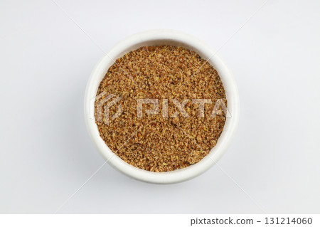 Pile of flax seeds isolated on white background Pile of flax seeds isolated on white background 131214060
