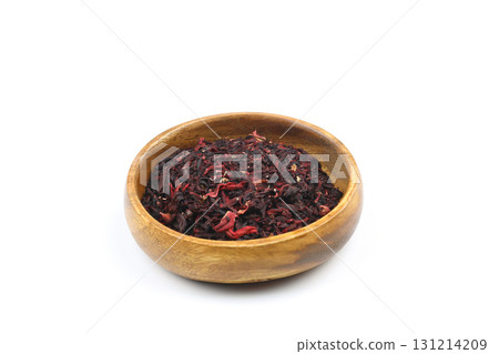 Karkade tea. Hibiscus tea leaves in wooden bowl isolated on white background. File contains clipping path. Top view. 131214209