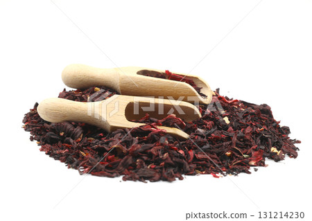 Karkade tea. Hibiscus tea leaves in wooden scoop isolated on white background. File contains clipping path. Top view. 131214230