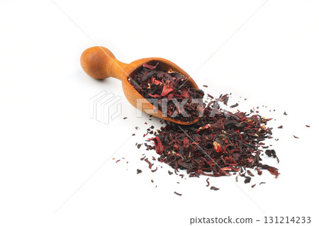 Karkade tea. Hibiscus tea leaves in wooden scoop isolated on white background. File contains clipping path. Top view. 131214233