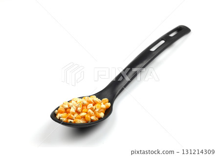 sweet corn in the black spoon an isolated on white background 131214309