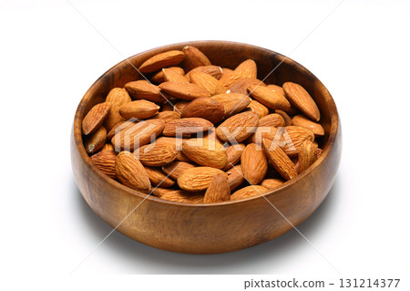 Fresh healthy Almond in bowl on isolated white background. Top view. Fresh healthy Almond in bowl on isolated white background. Top view. 131214377