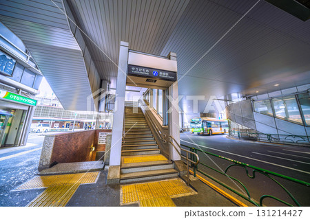 Tokyo cityscape, Japan, September 24th. The Shiodome business district. View of the Yurikamome Shinbashi Station entrance and exit. JR Shinbashi Station is in the background. Tokyo cityscape, Japan, September 24th. The Shiodome business district. View of the Yurikamome Shinbashi Station entrance and exit. JR Shinbashi Station is in the background. 131214427