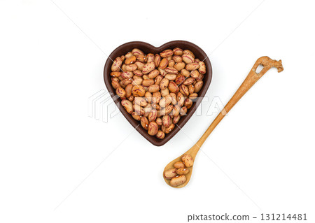 red kidney beans in wooden spoon isolated on white background. red kidney beans in wooden spoon isolated on white background. 131214481