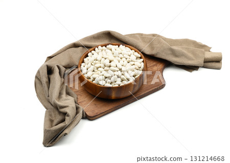white kidney bean in wooden bowl isolated on white background. Top view. Flat lay white kidney bean in wooden bowl isolated on white background. Top view. Flat lay 131214668