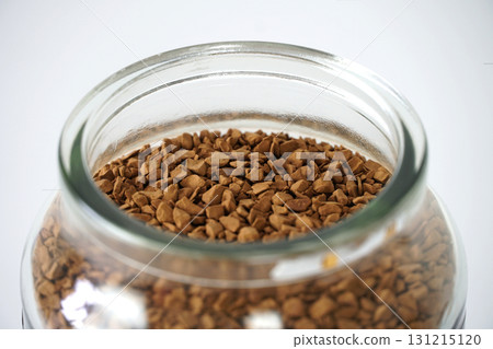 Close up view of freeze dried instant coffee in a glass jar 131215120