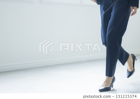 Women's leg with high heels 131215374