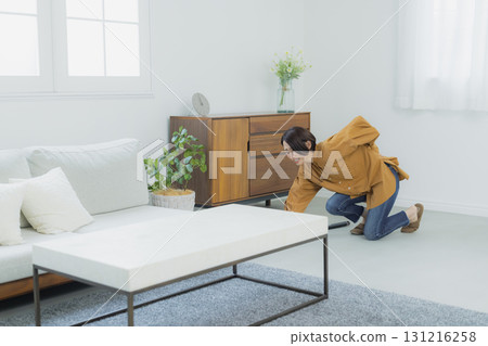 Middle-aged woman cleaning the floor 131216258