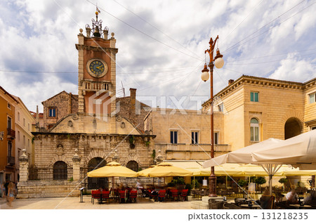 Summer scene at Zadar Narodni Trg with clock tower Summer scene at Zadar Narodni Trg with clock tower 131218235