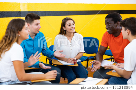 Men and women chatting in conversation club Men and women chatting in conversation club 131218894