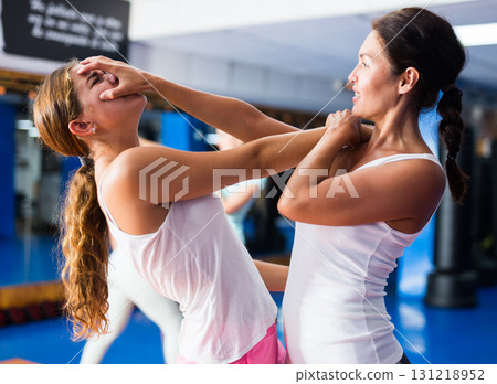 Women doing self protection movements Women doing self protection movements 131218952