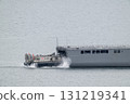An LCAC takes off from the Maritime Self-Defense Force transport ship Osumi in Kure Bay. 131219341