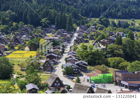 Shirakawa-go Gassho-style village and golden rice ears: Autumn rural scenery Shirakawa-go Gassho-style village and golden rice ears: Autumn rural scenery 131220841