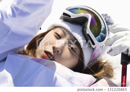 Cute woman enjoying skiing Cute woman enjoying skiing 131220865