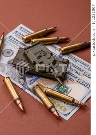 Money, cash dollars to fund weapons for war and defense against attack. Dollars for war Money, cash dollars to fund weapons for war and defense against attack. Dollars for war 131221007