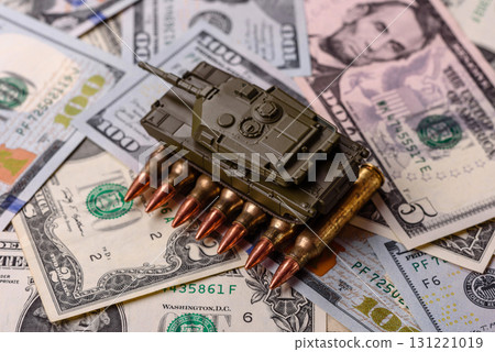 Money, cash dollars to fund weapons for war and defense against attack. Dollars for war 131221019