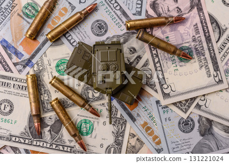 Money, cash dollars to fund weapons for war and defense against attack. Dollars for war Money, cash dollars to fund weapons for war and defense against attack. Dollars for war 131221024
