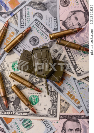 Money, cash dollars to fund weapons for war and defense against attack. Dollars for war Money, cash dollars to fund weapons for war and defense against attack. Dollars for war 131221025