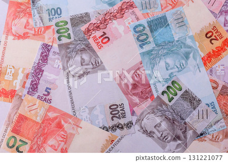 Cash paper money of Brazil, notes as a conceptual background of investment, savings Cash paper money of Brazil, notes as a conceptual background of investment, savings 131221077