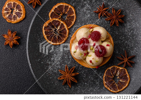 Sweet cake or tart round with cream and raspberries. Raspberry sweet tart Sweet cake or tart round with cream and raspberries. Raspberry sweet tart 131221144