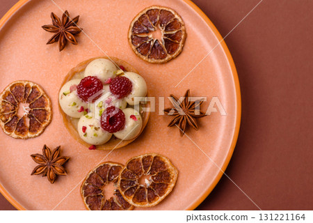 Sweet cake or tart round with cream and raspberries. Raspberry sweet tart Sweet cake or tart round with cream and raspberries. Raspberry sweet tart 131221164