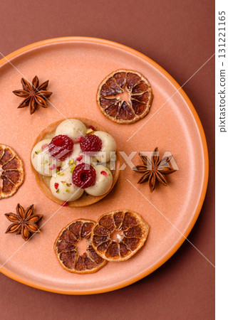 Sweet cake or tart round with cream and raspberries. Raspberry sweet tart 131221165