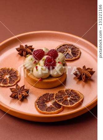 Sweet cake or tart round with cream and raspberries. Raspberry sweet tart 131221166