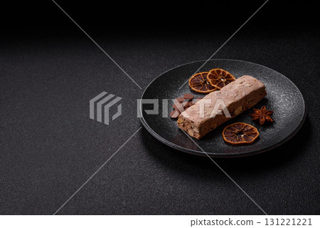 Nougat or white caramel with hazelnuts and pistachios and citrus pieces. White nougat with nuts Nougat or white caramel with hazelnuts and pistachios and citrus pieces. White nougat with nuts 131221221
