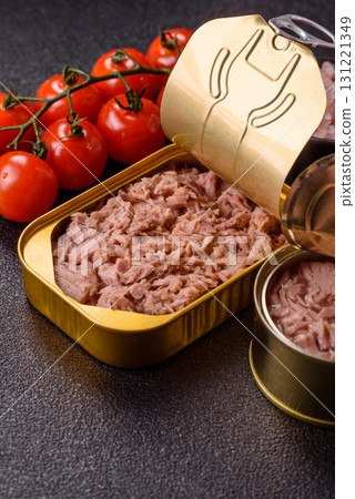 Tuna, canned fish in a can and on a plate for making sandwiches and other food. Canned tuna Tuna, canned fish in a can and on a plate for making sandwiches and other food. Canned tuna 131221349