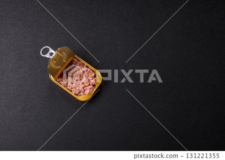 Tuna, canned fish in a can and on a plate for making sandwiches and other food. Canned tuna Tuna, canned fish in a can and on a plate for making sandwiches and other food. Canned tuna 131221355