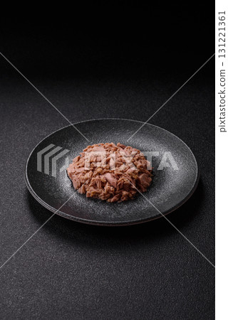 Tuna, canned fish in a can and on a plate for making sandwiches and other food. Canned tuna 131221361