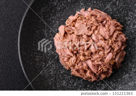 Tuna, canned fish in a can and on a plate for making sandwiches and other food. Canned tuna 131221363
