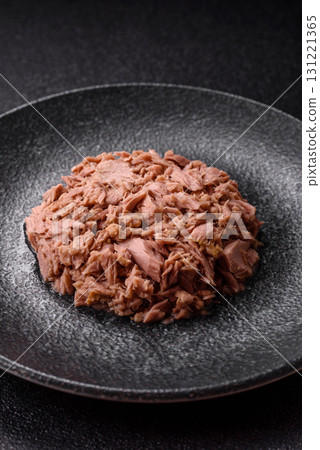 Tuna, canned fish in a can and on a plate for making sandwiches and other food. Canned tuna 131221365