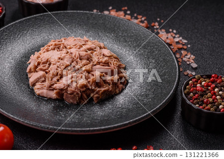 Tuna, canned fish in a can and on a plate for making sandwiches and other food. Canned tuna Tuna, canned fish in a can and on a plate for making sandwiches and other food. Canned tuna 131221366