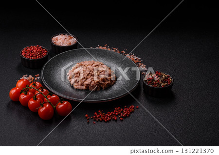 Tuna, canned fish in a can and on a plate for making sandwiches and other food. Canned tuna Tuna, canned fish in a can and on a plate for making sandwiches and other food. Canned tuna 131221370