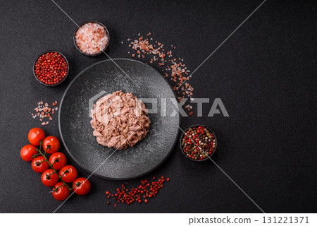 Tuna, canned fish in a can and on a plate for making sandwiches and other food. Canned tuna Tuna, canned fish in a can and on a plate for making sandwiches and other food. Canned tuna 131221371