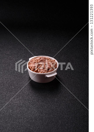 Tuna, canned fish in a can and on a plate for making sandwiches and other food. Canned tuna 131221393